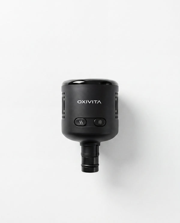 Oxivita Duo Head varme- og kulderecovery-hode i matt sort sett ovenfra mot nøytral lys bakgrunn
